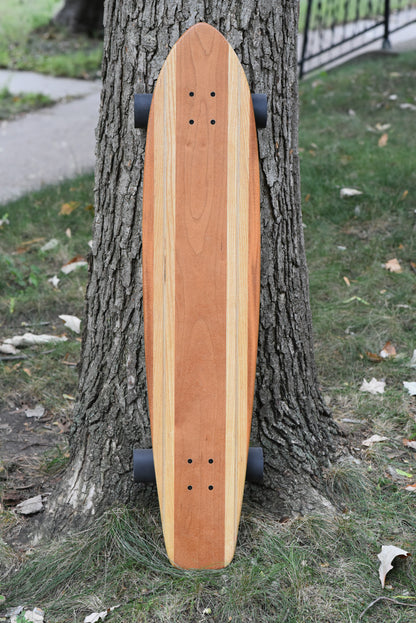 Cherry Pintail with Maple, Mahogany and Ash Accents.